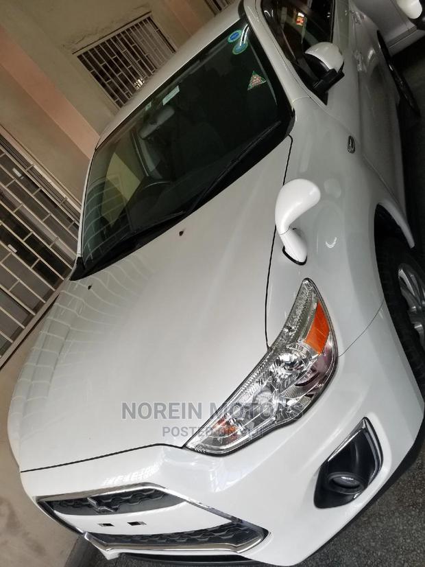 White Mitsubishi RVR 2014: Compact and Spacious SUV for Sale