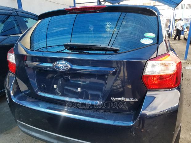 2014 Subaru Impreza in Matt Black: Power and Elegance