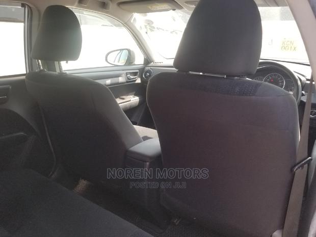 2015 Toyota Fielder in Silver: Efficient Sedan for Your Daily Drive