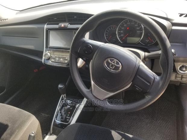 2015 Toyota Fielder in Silver: Efficient Sedan for Your Daily Drive