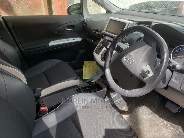 2015 Toyota Wish in Off-White: Comfortable and Modern