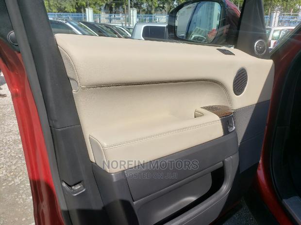 Used 2015 Land Rover Range Rover Sport in Orange: Stylish and Powerful!