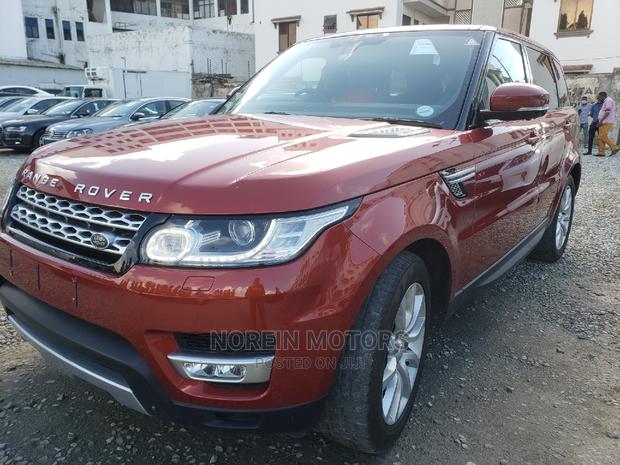 Used 2015 Land Rover Range Rover Sport in Orange: Stylish and Powerful!