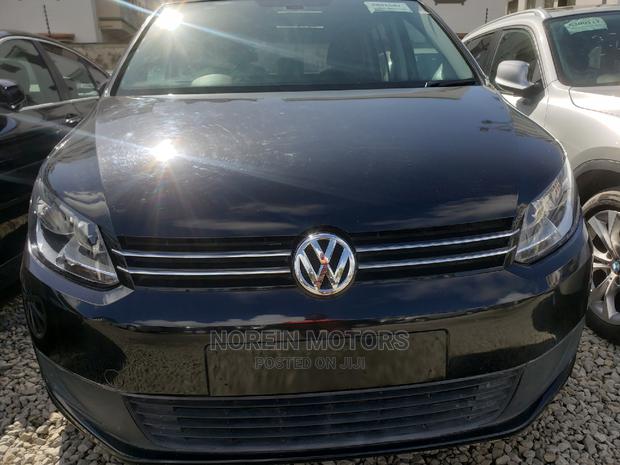 Ivory 2015 Volkswagen Touran - Used, Affordable, and Family-Friendly
