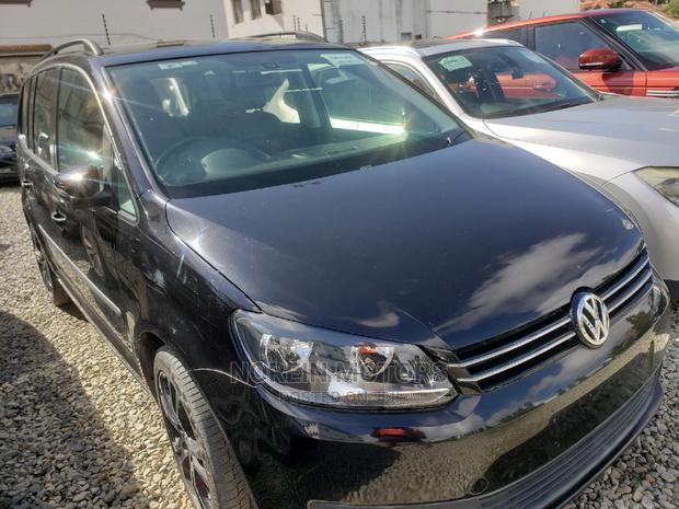 Ivory 2015 Volkswagen Touran - Used, Affordable, and Family-Friendly