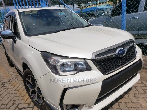 Subaru Forester 2015 in Off White: Durable and Elegant
