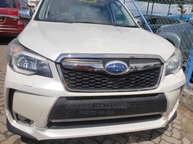 Subaru Forester 2015 in Off White: Durable and Elegant