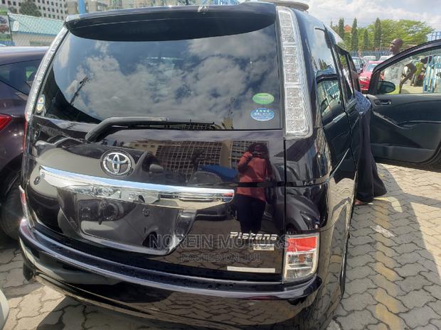 2015 Toyota ISIS in Purple - Sleek Sedan for Your Drive