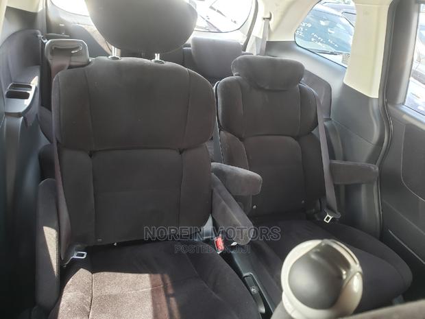 2014 Honda Odyssey Blue: Affordable and Efficient Minivan