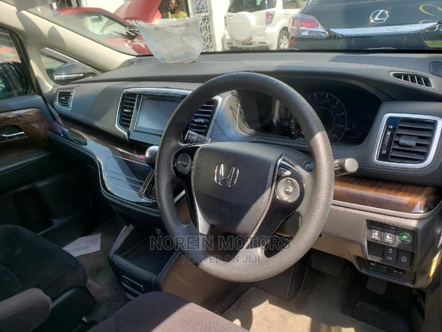 2014 Honda Odyssey Blue: Affordable and Efficient Minivan