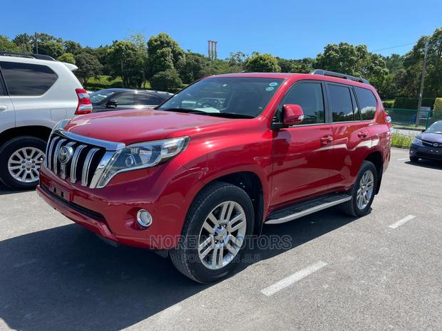 Red 2015 Toyota Land Cruiser Prado: Powerful Off-Road Vehicle