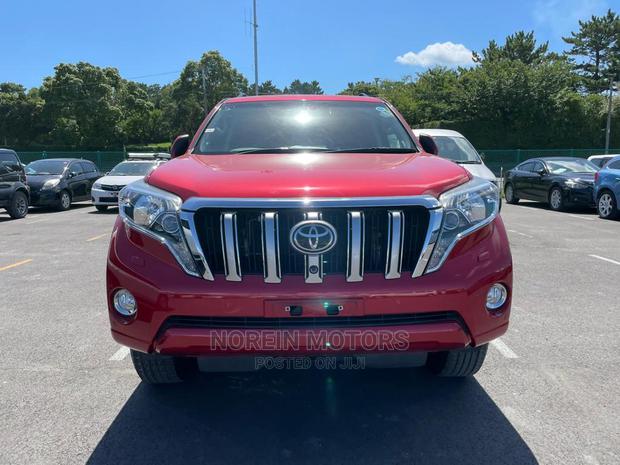 Red 2015 Toyota Land Cruiser Prado: Powerful Off-Road Vehicle