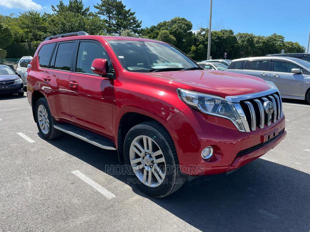 Red 2015 Toyota Land Cruiser Prado: Powerful Off-Road Vehicle