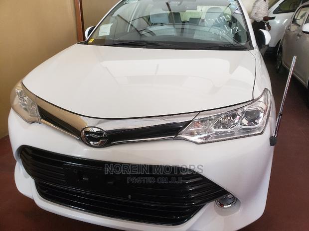 Toyota Axio 2015 - White Edition - Efficient and Stylish