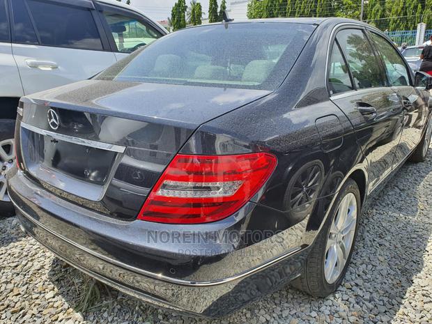 Gray Mercedes-Benz C200 2014: High-Quality Pre-Owned Luxury Car