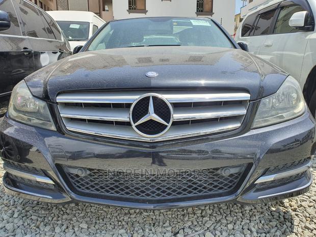 Gray Mercedes-Benz C200 2014: High-Quality Pre-Owned Luxury Car