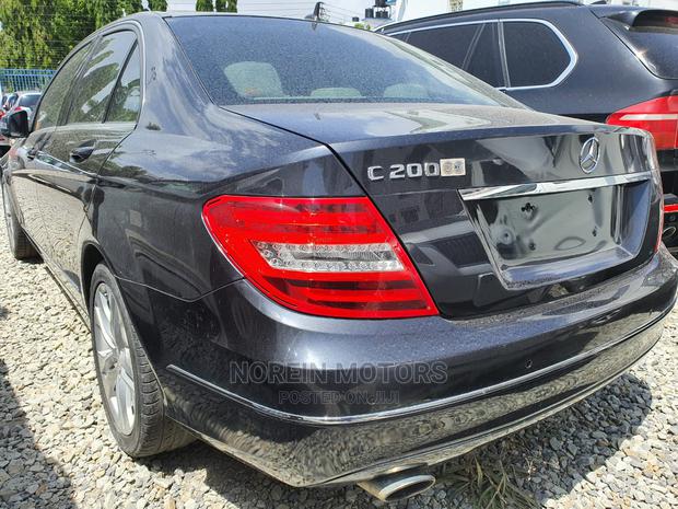 Gray Mercedes-Benz C200 2014: High-Quality Pre-Owned Luxury Car