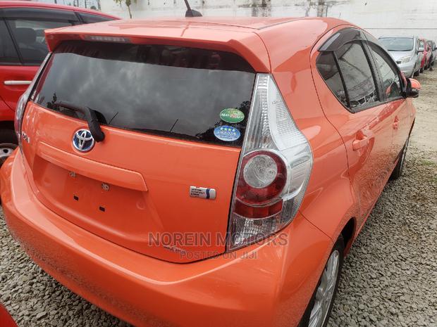 2015 Toyota Aqua in Orange - A Vibrant, Reliable and Efficient Compact Car