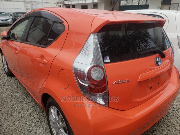 2015 Toyota Aqua in Orange - A Vibrant, Reliable and Efficient Compact Car