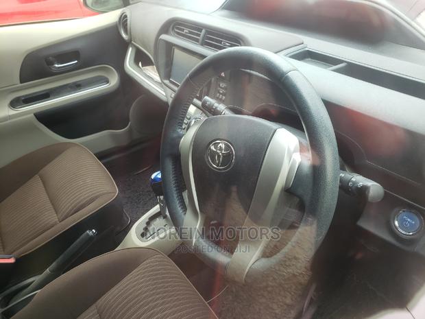 2015 Toyota Aqua in Orange - A Vibrant, Reliable and Efficient Compact Car