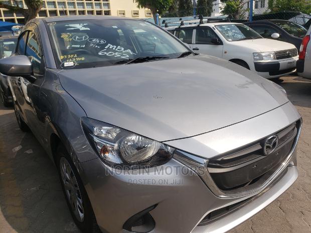 Gray Mazda Demio 2015 - Reliable Compact Car for Sale