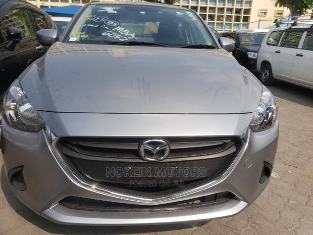 Gray Mazda Demio 2015 - Reliable Compact Car for Sale