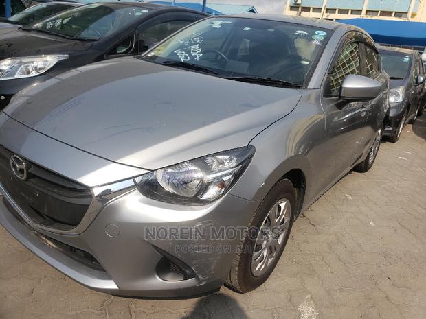 Gray Mazda Demio 2015 - Reliable Compact Car for Sale
