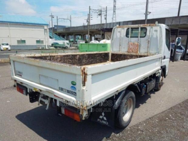 White Mitsubishi Canter 2014 - High-Performance Used Truck