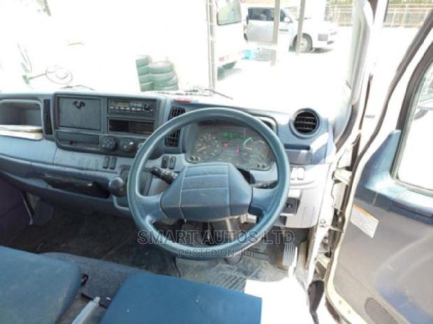 White Mitsubishi Canter 2014 - High-Performance Used Truck