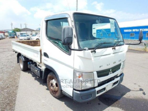 White Mitsubishi Canter 2014 - High-Performance Used Truck