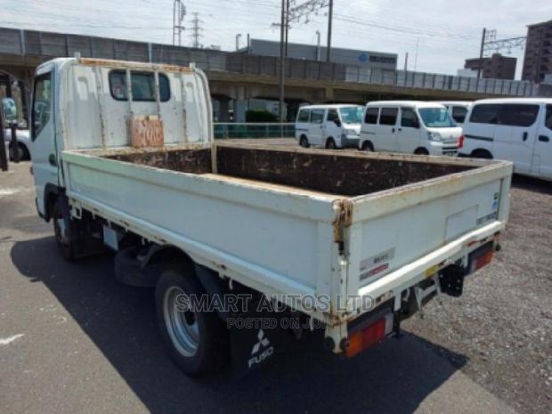 White Mitsubishi Canter 2014 - High-Performance Used Truck