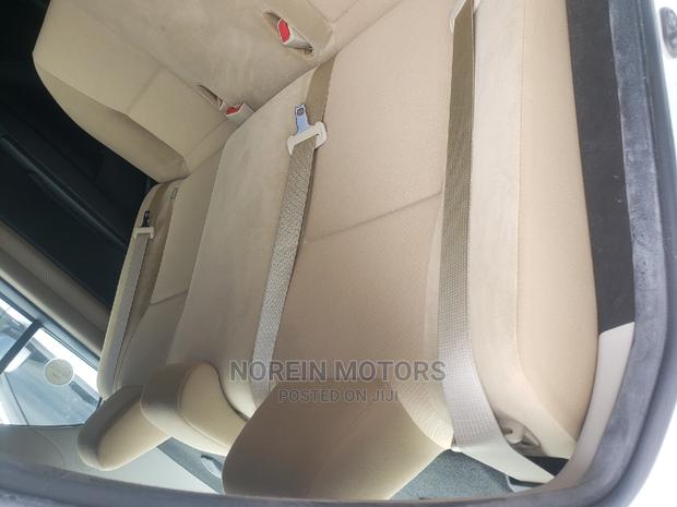 2015 Toyota Axio Off-White: Compact Sedan with Elegance