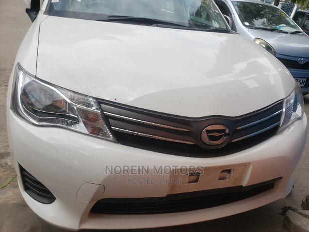 2015 Toyota Axio Off-White: Compact Sedan with Elegance