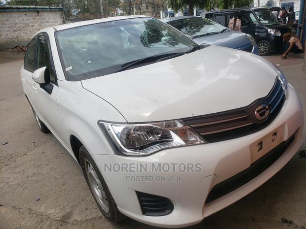 2015 Toyota Axio Off-White: Compact Sedan with Elegance