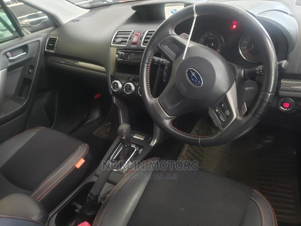 2015 Subaru Forester with Orange Exterior: Sleek and Spacious SUV