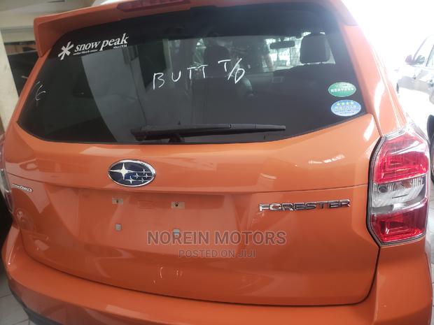 2015 Subaru Forester with Orange Exterior: Sleek and Spacious SUV