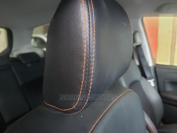 2015 Subaru Forester with Orange Exterior: Sleek and Spacious SUV