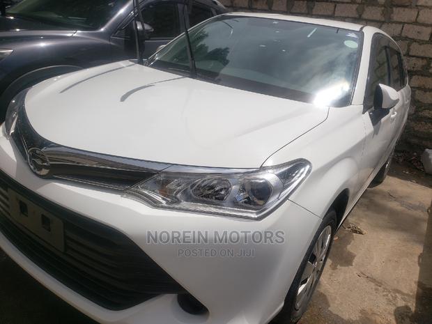 Experience luxury in the 2015 Toyota Fielder Corolla Pearl, a spacious