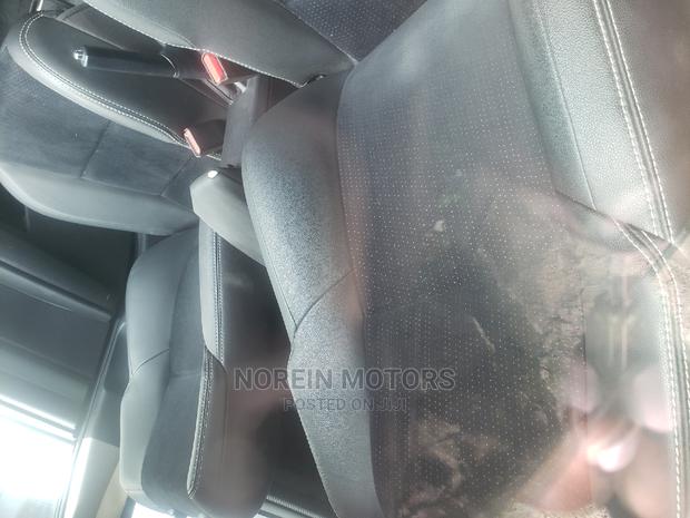 Experience luxury in the 2015 Toyota Fielder Corolla Pearl, a spacious