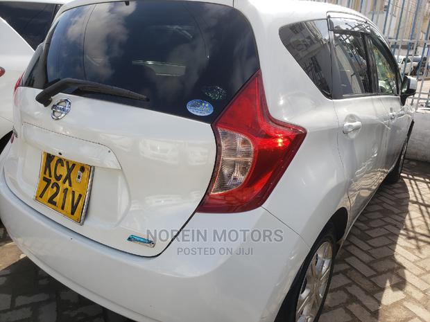 2013 Nissan Note in Orange: Used but Well-Maintained