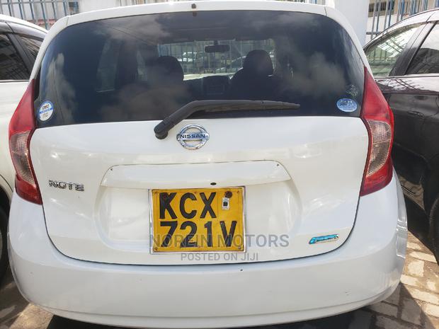2013 Nissan Note in Orange: Used but Well-Maintained