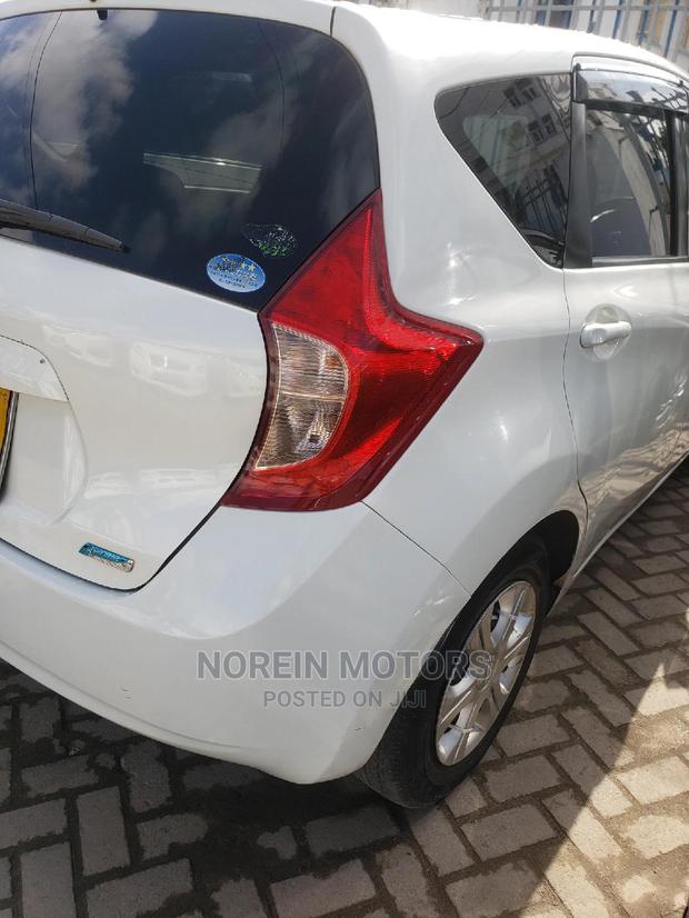 2013 Nissan Note in Orange: Used but Well-Maintained