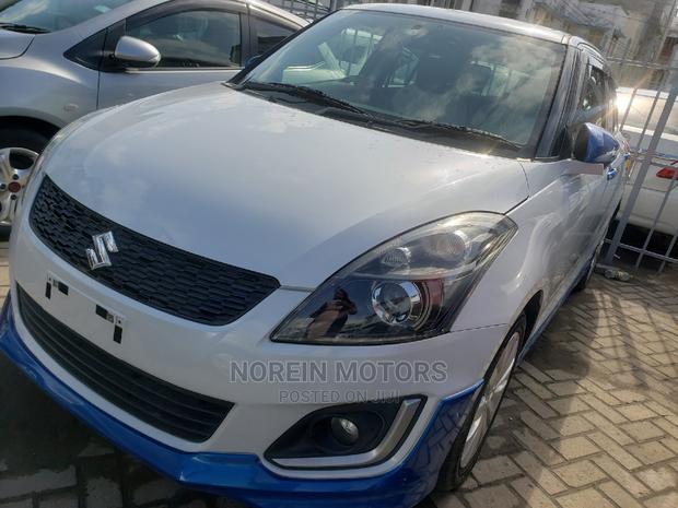 2015 Suzuki Swift White: Compact Car that Stands Out