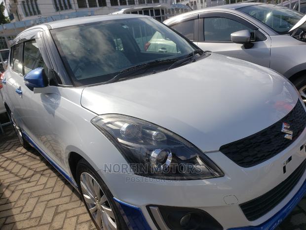 2015 Suzuki Swift White: Compact Car that Stands Out