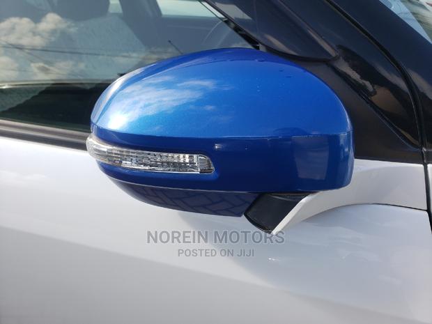 2015 Suzuki Swift White: Compact Car that Stands Out