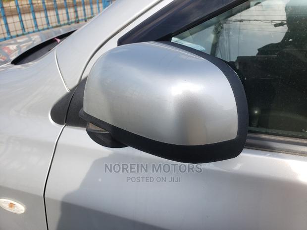 2015 Nissan Tiida Blue: Reliable Compact Sedan for Your Needs