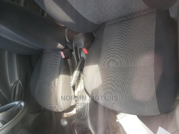 2015 Nissan Tiida Blue: Reliable Compact Sedan for Your Needs