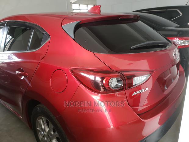 2015 Mazda Axela in Burgundy: Stylish and Reliable Sedan