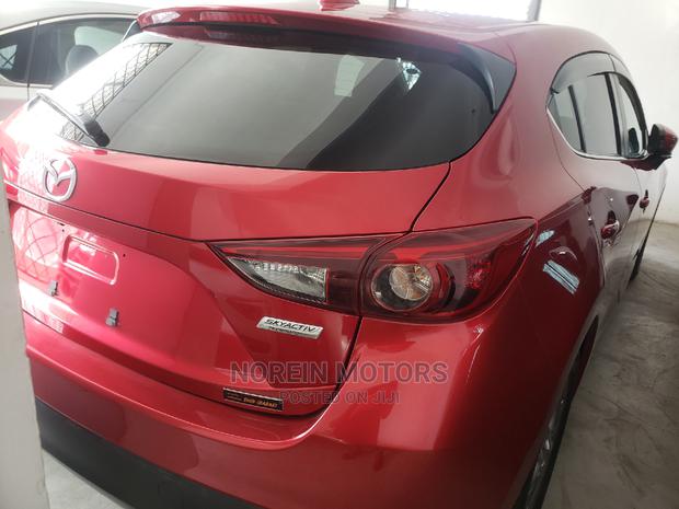 2015 Mazda Axela in Burgundy: Stylish and Reliable Sedan