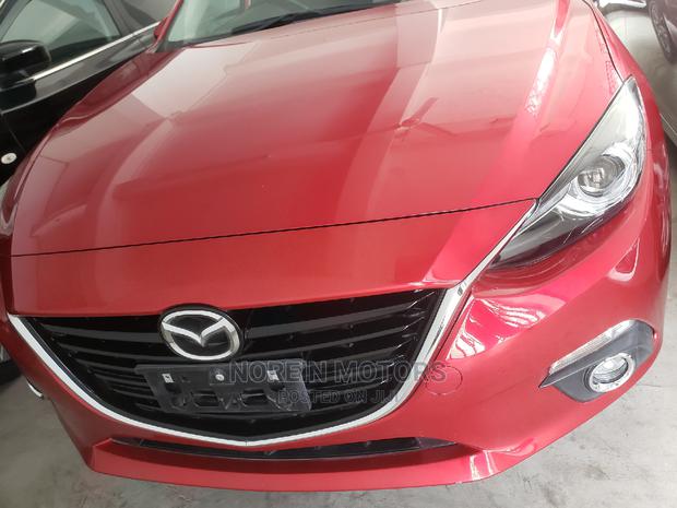 2015 Mazda Axela in Burgundy: Stylish and Reliable Sedan